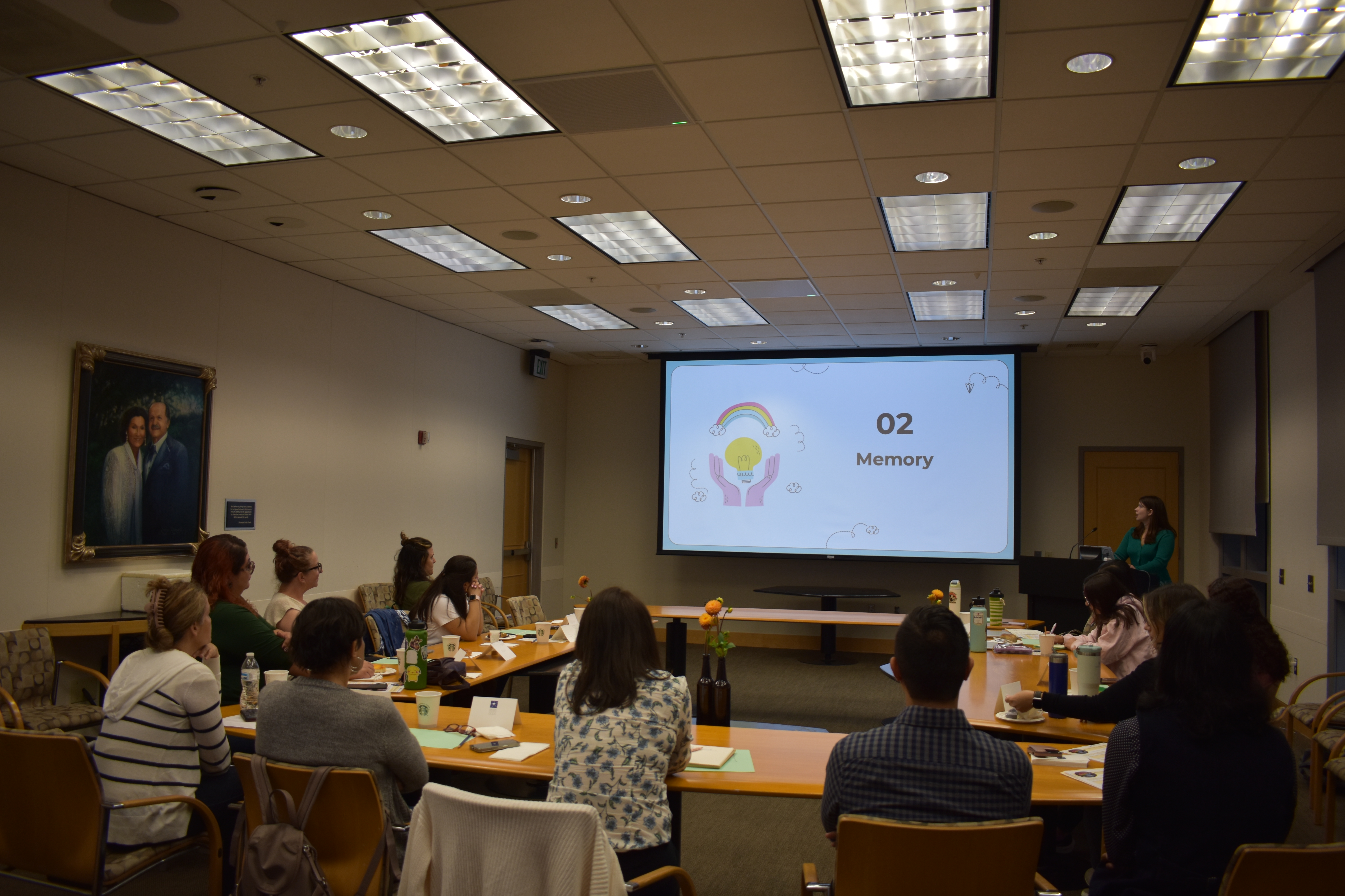 Teachers engaged in neuroscience lecture