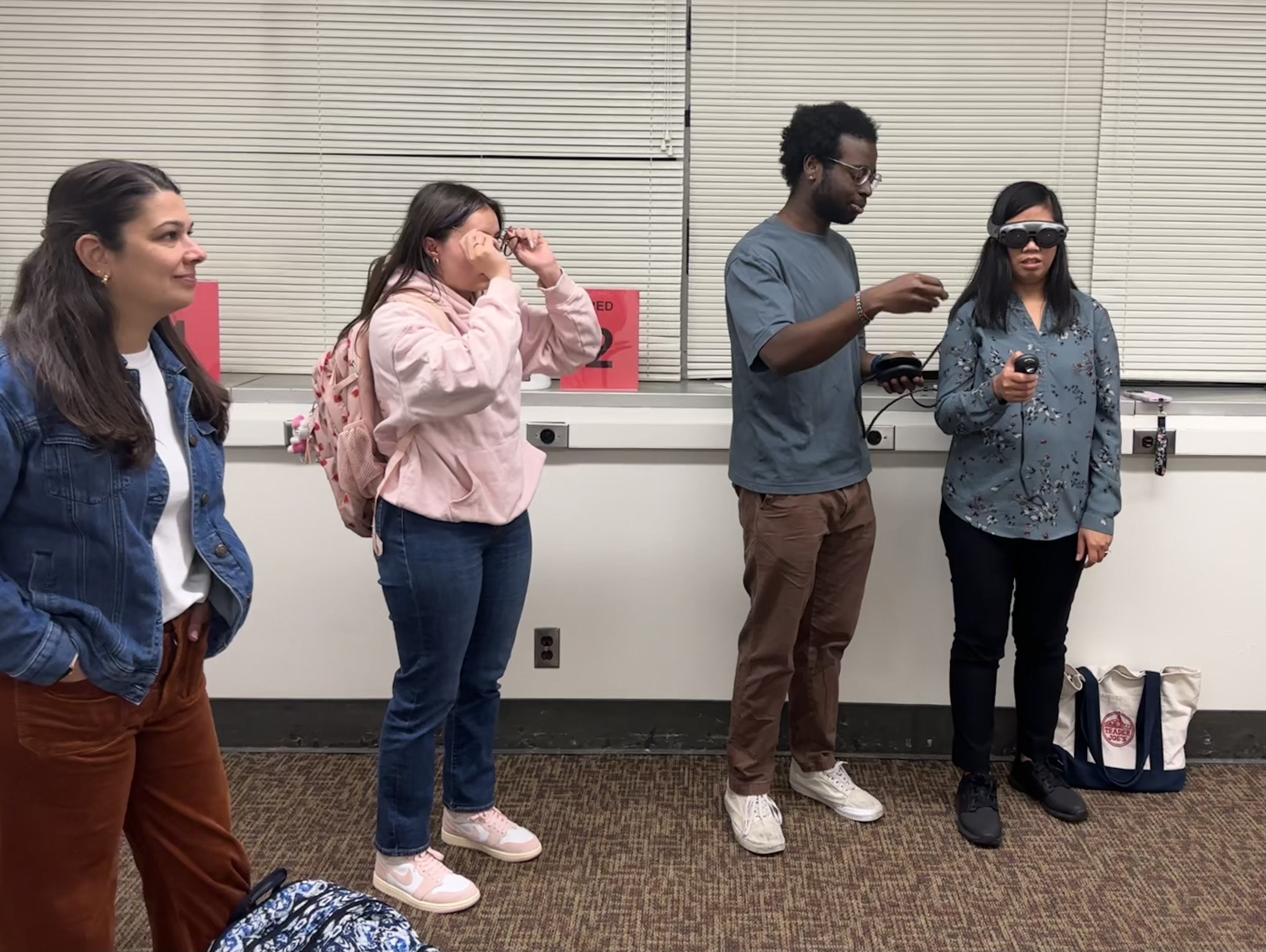 Teachers trying VR headsets in neuroscience lab